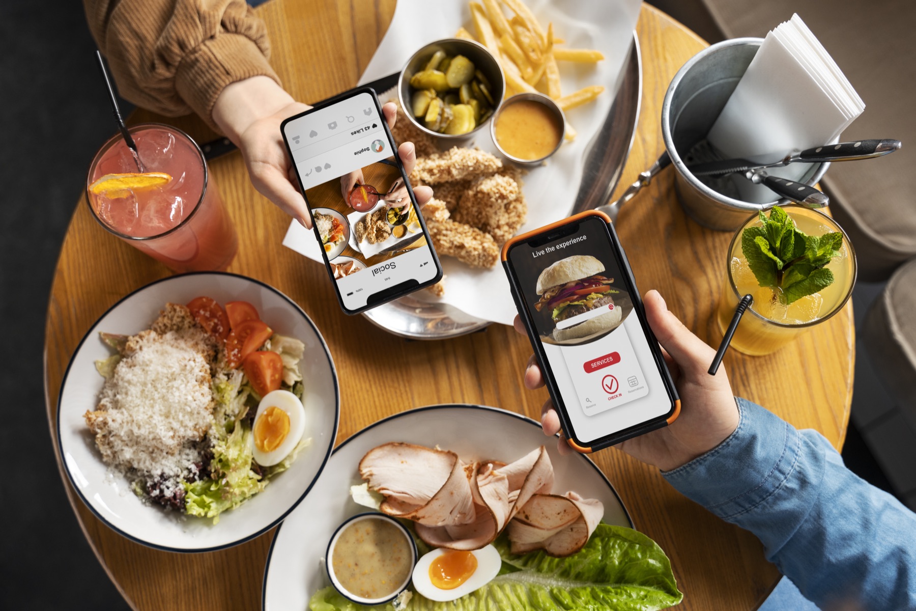 People photographing food on their phones